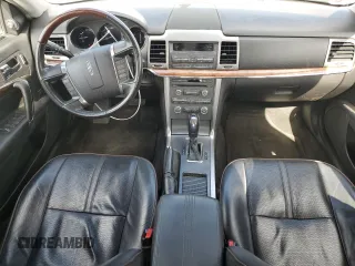 2012 Lincoln MKZ z VIN 3LNHL2GC4CR804632, wystawiony jako Copart lot #55783535 z przebiegiem 148 036 mil mil oraz Szkoda całkowita • Salvage title. Historia ofert i sprzedaży dostępna na DreamBid. Obrazek 8.