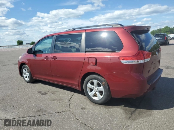 2012 Toyota Sienna LE AAS with VIN 5TDKK3DC7CS195590, listed as a Copart auction lot 57968415 with 201,732 mi miles and Salvage title. Bid and sale history available at DreamBid. Image 2.