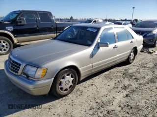 1996 Mercedes-Benz S with VIN WDBGA43E9TA311921, listed as a Copart auction lot 88758965 with 141,035 mi miles and Salvage Title. Bid and sale history available at DreamBid. Image 1.