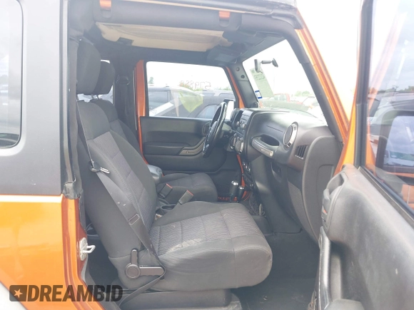 2011 Jeep Wrangler Sport with VIN 1J4AA2D1XBL579882, listed as a IAAI auction lot 42122353 with 153,885 mi miles and . Bid and sale history available at carsss.com. Image 5.