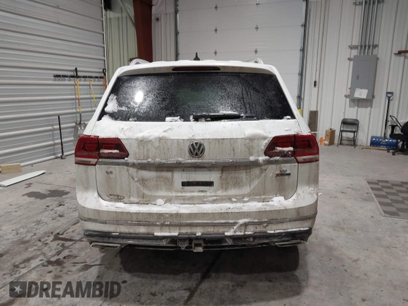 2019 Volkswagen Atlas SE z VIN 1V2XR2CA0KC595596, wystawiony jako IAAI lot #41410019 z przebiegiem 103 336 mil mil oraz . Historia ofert i sprzedaży dostępna na DreamBid. Obrazek 17.