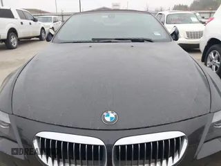 2007 BMW 6 Series M6 z VIN WBSEK93587CY78191, wystawiony jako IAAI lot #41703769 z przebiegiem Nie podano mil oraz . Historia ofert i sprzedaży dostępna na DreamBid. Obrazek 12.