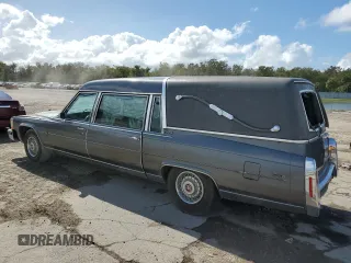 1988 Cadillac Brougham z VIN 1G6DW51Y2J9714052, wystawiony jako Copart lot #77274064 z przebiegiem 69 106 mil mil oraz Szkody całkowita. Historia ofert i sprzedaży dostępna na DreamBid. Obrazek 2.