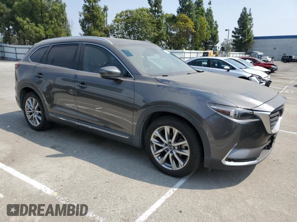 2017 Mazda CX-9 Grand Touring with VIN JM3TCBDY7H0131798, listed as a Copart auction lot 71488124 with 206,904 mi miles and Clean Title. Bid and sale history available at carsss.com. Image 4.