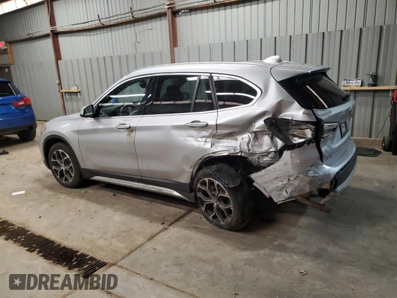 2021 BMW X1 xDrive28i with VIN WBXJG9C01M5T49891, listed as a Copart auction lot 51126685 with 93,696 mi miles and Clean Title. Bid and sale history available at carsss.com. Image 2.