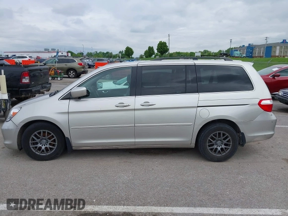 2007 Honda Odyssey Touring z VIN 5FNRL38877B091046, wystawiony jako IAAI lot #42187965 z przebiegiem Nie podano mil oraz . Historia ofert i sprzedaży dostępna na DreamBid. Obrazek 14.