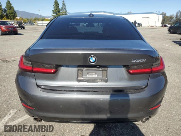 2019 BMW 3 Series 330i z VIN WBA5R1C57KFH22056, wystawiony jako Copart lot #49896985 z przebiegiem 58 311 mil mil oraz Szkody całkowita. Historia ofert i sprzedaży dostępna na DreamBid. Obrazek 6.