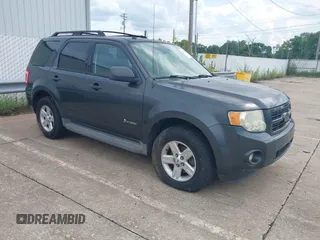 2009 Ford Escape Hybrid z VIN 1FMCU49319KC97511, wystawiony jako IAAI lot #42735047 z przebiegiem 255 260 mil mil oraz . Historia ofert i sprzedaży dostępna na DreamBid. Obrazek 1.