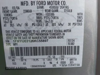 2006 Ford Escape XLT with VIN 1FMYU03126KC55897, listed as a IAAI auction lot 41733243 with 136,989 mi miles. Bid and sale history available at carsss.com. Image 9.