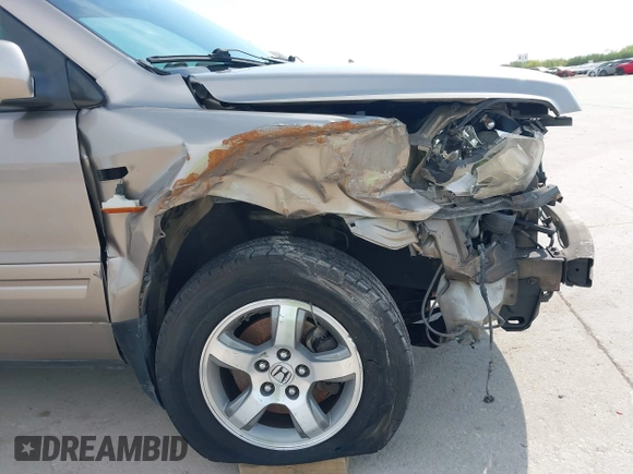 2006 Honda Pilot EX-L with VIN 5FNYF18586B028291, listed as a IAAI auction lot 42040904 with 217,038 mi miles and . Bid and sale history available at carsss.com. Image 18.