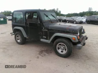2002 Jeep Wrangler X z VIN 1J4FA39S82P751915, wystawiony jako IAAI lot #42513259 z przebiegiem 261 831 mil mil oraz . Historia ofert i sprzedaży dostępna na DreamBid. Obrazek 1.