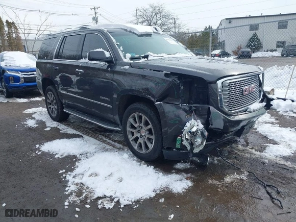 2016 GMC Yukon Denali with VIN 1GKS2CKJ5GR412709, listed as a IAAI auction lot 41530372 with 105,555 mi miles. Bid and sale history available at carsss.com. Image 1.
