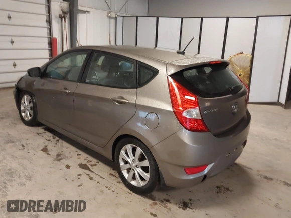2013 Hyundai Accent SE with VIN KMHCU5AE6DU097353, listed as a IAAI auction lot 41937225 with 173,447 mi miles. Bid and sale history available at carsss.com. Image 3.