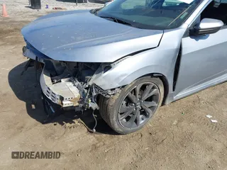 2021 Honda Civic Sport with VIN 2HGFC2F83MH540939, listed as a IAAI auction lot 41789508 with 100,274 mi miles and . Bid and sale history available at DreamBid. Image 6.