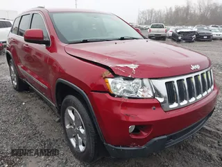 2013 Jeep Grand Cherokee Laredo with VIN 1C4RJEAG0DC516926, listed as a IAAI auction lot 41800254 with 259,006 mi miles. Bid and sale history available at carsss.com. Image 6.