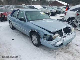 2003 Mercury Grand Marquis GS Convenience with VIN 2MEFM74W13X616042, listed as a IAAI auction lot 41552887 with 94,387 mi miles. Bid and sale history available at carsss.com. Image 1.