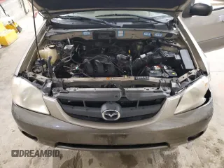 2001 Mazda Tribute LX with VIN 4F2CU08101KM05943, listed as a Copart auction lot 84077694 with 137,937 mi miles and Salvage Title. Bid and sale history available at DreamBid. Image 12.