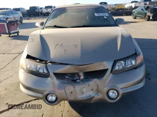 2002 Pontiac Bonneville SLE z VIN 1G2HY54K424205499, wystawiony jako Copart lot #76815334 z przebiegiem 84 715 mil mil oraz Szkoda całkowita • Salvage title. Historia ofert i sprzedaży dostępna na DreamBid. Obrazek 5.