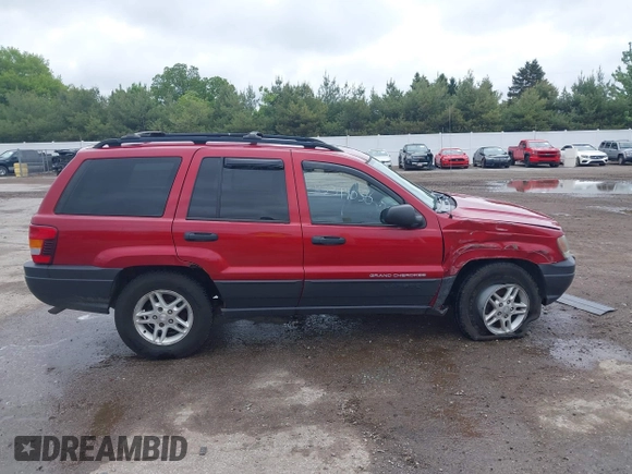 2003 Jeep Grand Cherokee Laredo with VIN 1J4GW48S73C611070, listed as a IAAI auction lot 42319030 with 177,771 mi miles and . Bid and sale history available at DreamBid. Image 13.