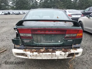 2000 Subaru Legacy with VIN 4S3BE6453Y7215569, listed as a Copart auction lot 81493564 with 218,045 mi miles and Salvage title. Bid and sale history available at DreamBid. Image 6.