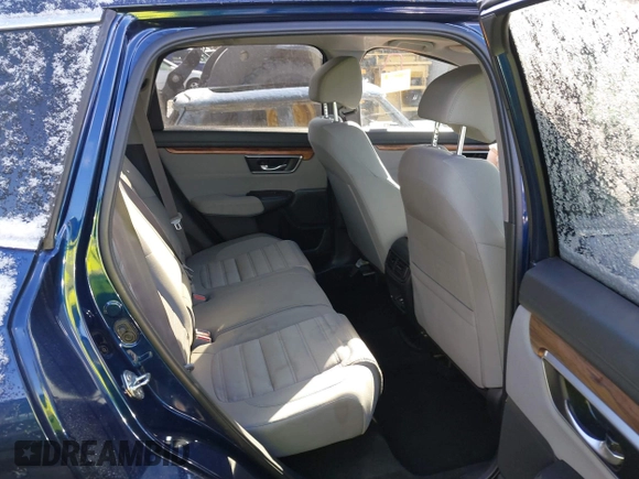 2019 Honda CR-V EX with VIN 2HKRW2H54KH630921, listed as a IAAI auction lot 41366277 with 103,075 mi miles and . Bid and sale history available at DreamBid. Image 8.