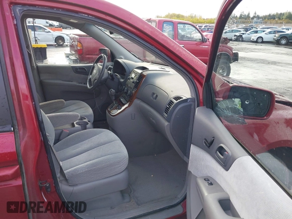 2006 Kia Sedona LX with VIN KNDMB233X66030979, listed as a IAAI auction lot 41933430 with 127,305 mi miles and . Bid and sale history available at DreamBid. Image 5.