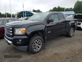 2015 GMC Canyon 4WD SLE with VIN 1GTH6BE31F1135376, listed as a Copart auction lot 63967815 with 205,829 mi miles and Salvage title. Bid and sale history available at DreamBid. Image 1.