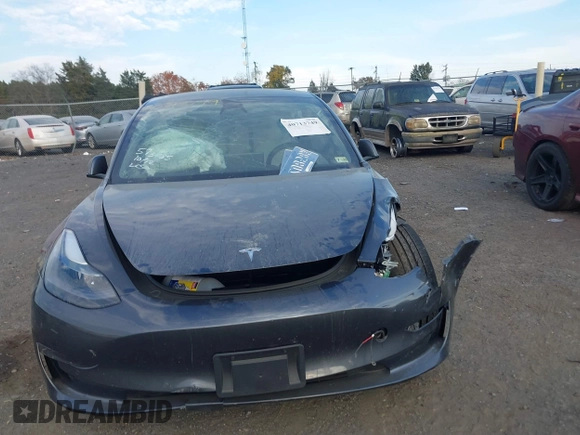 2021 Tesla Model 3 Long Range with VIN 5YJ3E1EB6MF975916, listed as a IAAI auction lot 40713749 with 29,593 mi miles and . Bid and sale history available at DreamBid. Image 11.