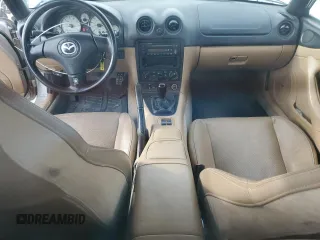 2001 Mazda MX-5 Miata with VIN JM1NB353510214097, listed as a Copart auction lot 50306595 with 111,359 mi miles and Salvage Title. Bid and sale history available at DreamBid. Image 8.