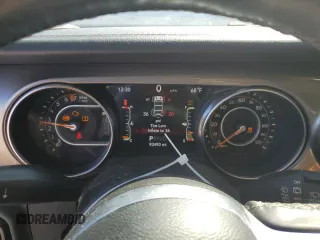 2021 Jeep Wrangler Unlimited Sahara High Altitude z VIN 1C4HJXEG4MW647079, wystawiony jako Copart lot #80202154 z przebiegiem 92 490 mil mil oraz Czysty tytuł • Clean title. Historia ofert i sprzedaży dostępna na DreamBid. Obrazek 9.