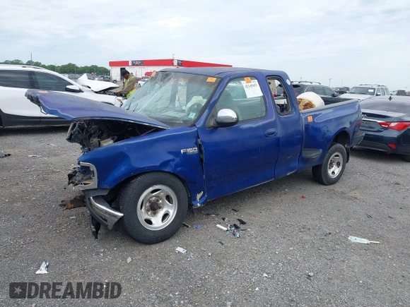 1998 Ford F-150 XL with VIN 2FTZX0722WCA65198, listed as a IAAI auction lot 42145451 with 188,529 mi miles and . Bid and sale history available at DreamBid. Image 2.