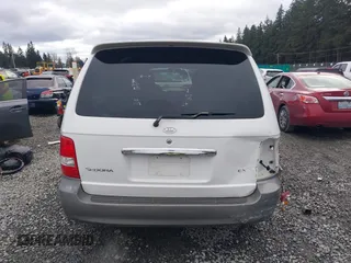 2005 Kia Sedona LX with VIN KNDUP132X56742698, listed as a IAAI auction lot 41637967 with 118,346 mi miles. Bid and sale history available at carsss.com. Image 17.