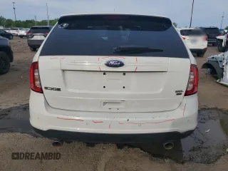 2013 Ford Edge SEL z VIN 2FMDK4JCXDBA38217, wystawiony jako Copart lot #58256755 z przebiegiem 151 551 mil mil oraz Szkoda całkowita • Salvage title. Historia ofert i sprzedaży dostępna na DreamBid. Obrazek 6.