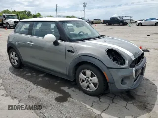 2017 MINI Hardtop Cooper with VIN WMWXP5C50H3B77981, listed as a Copart auction lot 54596525 with 99,393 mi miles and Salvage Title. Bid and sale history available at DreamBid. Image 4.