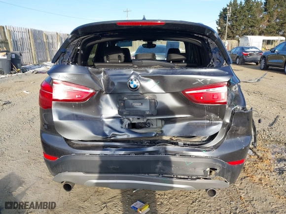 2018 BMW X1 xDrive28i with VIN WBXHT3C33J5F90349, listed as a IAAI auction lot 41385063 with 55,994 mi miles. Bid and sale history available at carsss.com. Image 17.