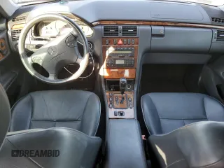 2002 Mercedes-Benz E-Class with VIN WDBJF65J02B473555, listed as a Copart auction lot 75505714 with 0 mi miles and Salvage Title. Bid and sale history available at carsss.com. Image 8.