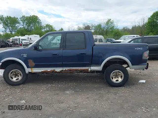 2003 Ford F-150 XLT with VIN 1FTRW08L63KD55851, listed as a IAAI auction lot 42359388 with Not provided miles and . Bid and sale history available at DreamBid. Image 14.