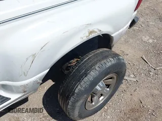 2003 Ford Ranger XL Fleet z VIN 1FTYR44V33PB16049, wystawiony jako IAAI lot #42242680 z przebiegiem 226 292 mil mil oraz . Historia ofert i sprzedaży dostępna na DreamBid. Obrazek 12.