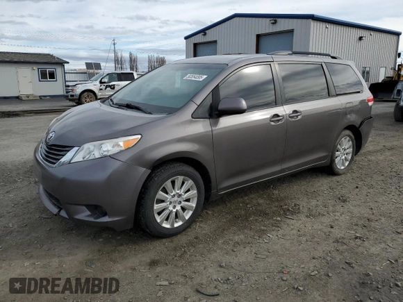 2014 Toyota Sienna LE with VIN 5TDJK3DC7ES073648, listed as a Copart auction lot 50554095 with 136,236 mi miles and Salvage Title. Bid and sale history available at DreamBid. Image 1.