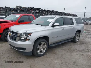2018 Chevrolet Suburban LT z VIN 1GNSCHKC1JR394991, wystawiony jako IAAI lot #41192222 z przebiegiem 90 313 mil mil oraz . Historia ofert i sprzedaży dostępna na DreamBid. Obrazek 2.