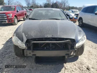 2013 Jaguar XJ Portfolio with VIN SAJWJ2GDXD8V45921, listed as a Copart auction lot 49289825 with 115,152 mi miles and Salvage title. Bid and sale history available at DreamBid. Image 5.