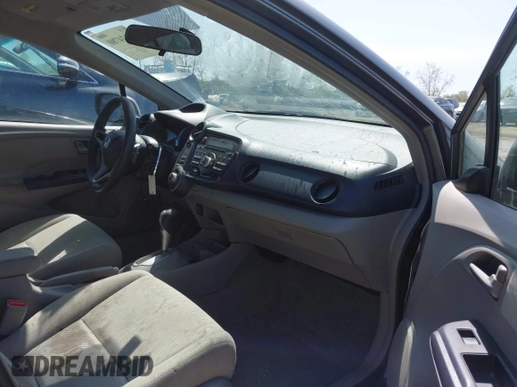 2010 Honda Insight EX with VIN JHMZE2H75AS008489, listed as a IAAI auction lot 42124780 with 226,100 mi miles and . Bid and sale history available at DreamBid. Image 5.