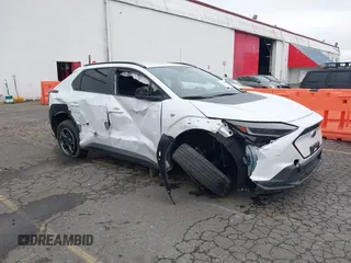 2024 Subaru Solterra Limited z VIN JTMABABA9RA056018, wystawiony jako IAAI lot #41611126 z przebiegiem 15 861 mil mil oraz . Historia ofert i sprzedaży dostępna na DreamBid. Obrazek 6.