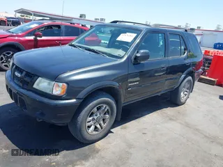 2004 Isuzu Rodeo S с VIN 4S2CK58YX44311680, выставлен на аукционе IAAI как лот 42476361 с пробегом 154 693 миль миль и . История ставок и продаж доступна на DreamBid. Изображение 2.