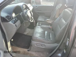 2006 Honda Odyssey EX-L z VIN 5FNRL386X6B031503, wystawiony jako Copart lot #59791425 z przebiegiem 138 624 mil mil oraz Czysty tytuł • Clean title. Historia ofert i sprzedaży dostępna na DreamBid. Obrazek 7.