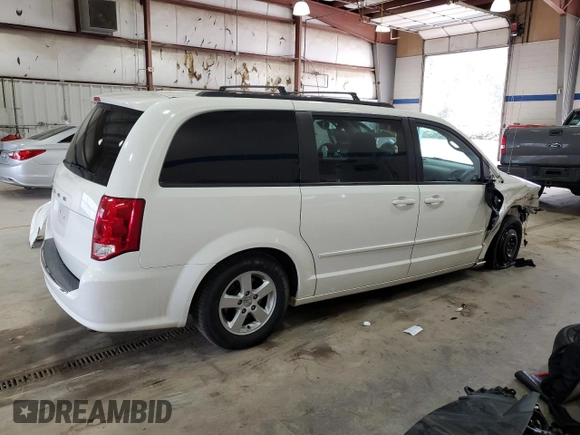 2012 Dodge Grand Caravan SXT with VIN 2C4RDGCG3CR179271, listed as a Copart auction lot 51491005 with 154,217 mi miles and Salvage Title. Bid and sale history available at DreamBid. Image 3.