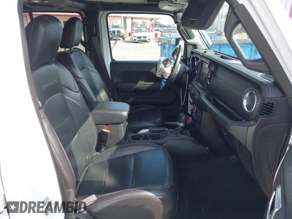 2019 Jeep Wrangler Unlimited Sahara with VIN 1C4HJXENXKW684942, listed as a IAAI auction lot 42021869 with 55,137 mi miles and . Bid and sale history available at DreamBid. Image 5.