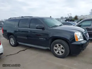 2013 GMC Yukon XL SLT with VIN 1GKS1KE00DR332987, listed as a IAAI auction lot 41512378 with 190,693 mi miles. Bid and sale history available at carsss.com. Image 13.