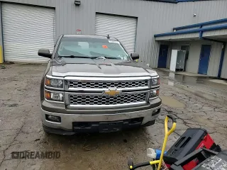 2015 Chevrolet Silverado 1500 LT with VIN 3GCUKREC3FG185054, listed as a Copart auction lot 45093615 with 87,907 mi miles and Salvage Title. Bid and sale history available at DreamBid. Image 11.