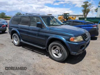 2001 Mitsubishi Montero ES z VIN JA4MT21H81P001568, wystawiony jako Copart lot #57666105 z przebiegiem 203 228 mil mil oraz Szkoda całkowita • Salvage title. Historia ofert i sprzedaży dostępna na DreamBid. Obrazek 4.